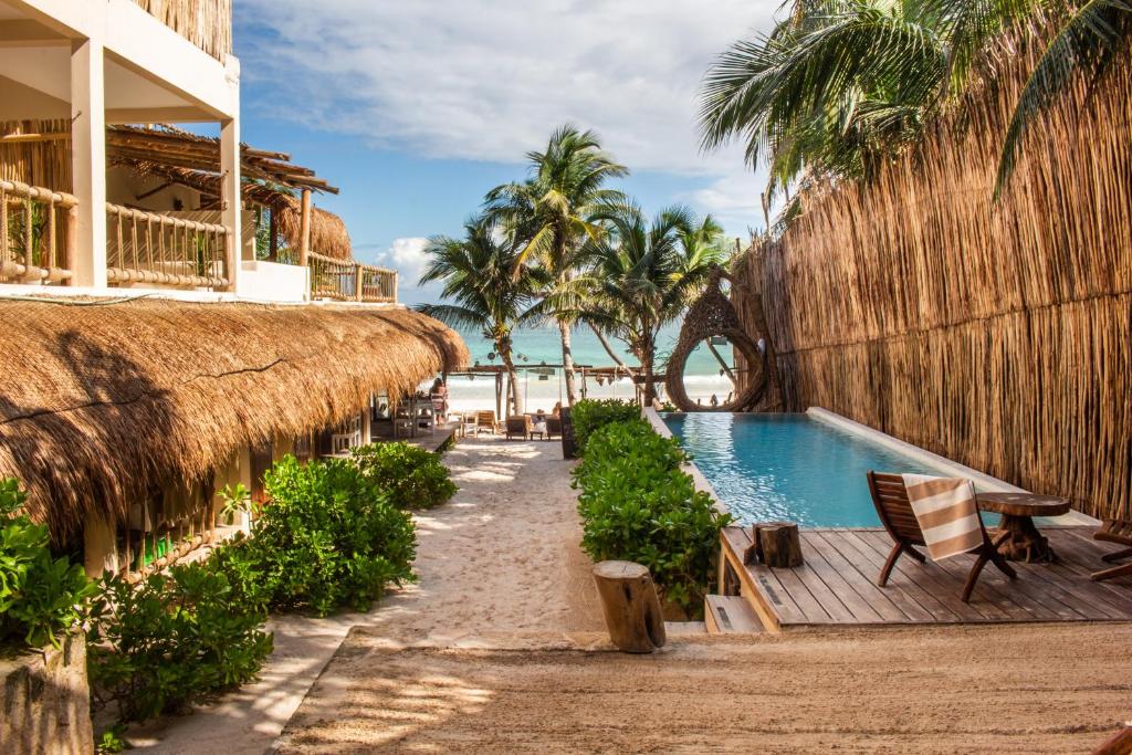 14 Coolest Hotels Tulum Beach You Can't Miss (Plus Map!)