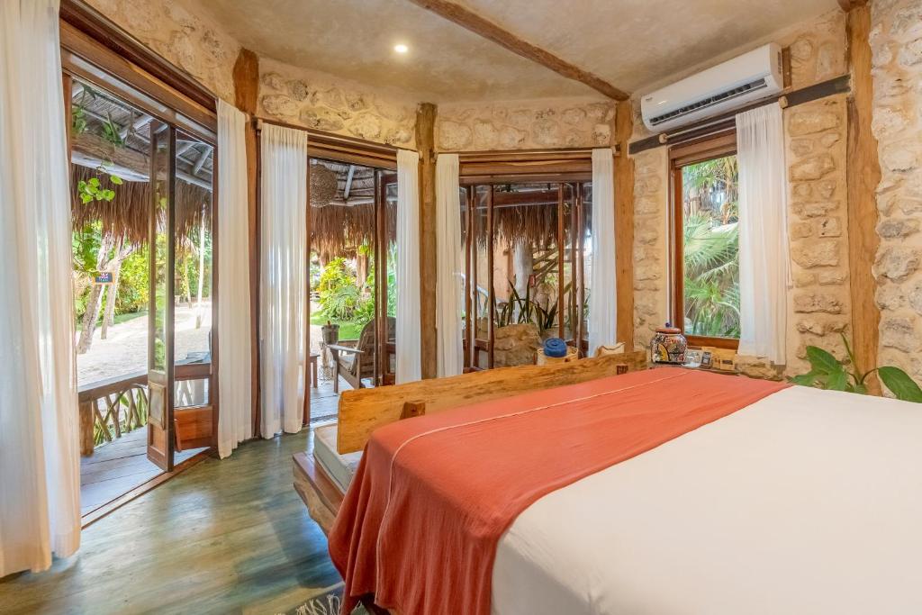 14 Coolest Hotels Tulum Beach You Can't Miss (Plus Map!)