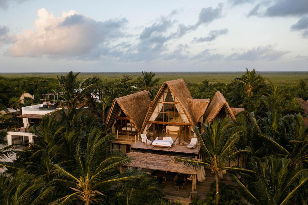 14 Coolest Hotels Tulum Beach You Can't Miss (Plus Map!)