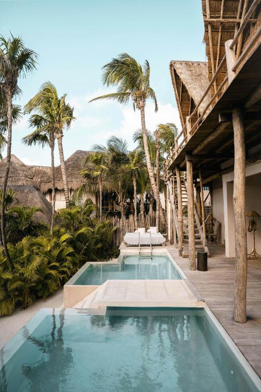 14 Coolest Hotels Tulum Beach You Can't Miss (Plus Map!)