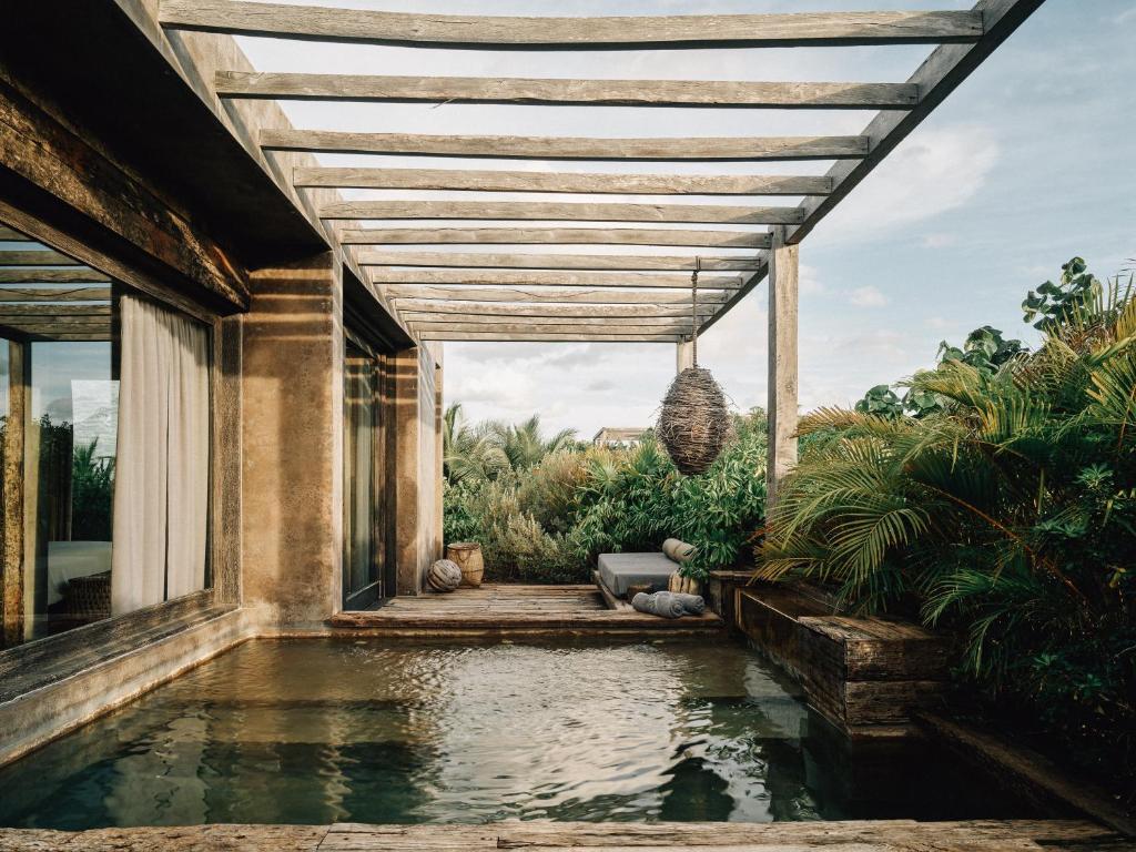 14 Coolest Hotels Tulum Beach You Can't Miss (Plus Map!)