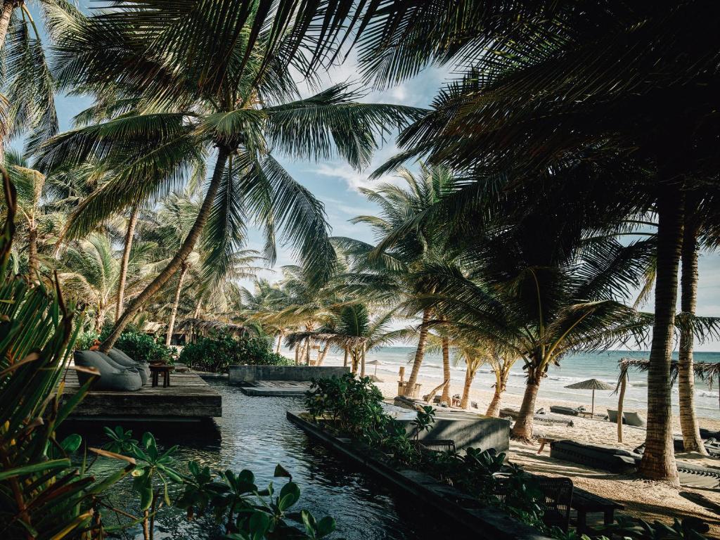 14 Coolest Hotels Tulum Beach You Can't Miss (Plus Map!)